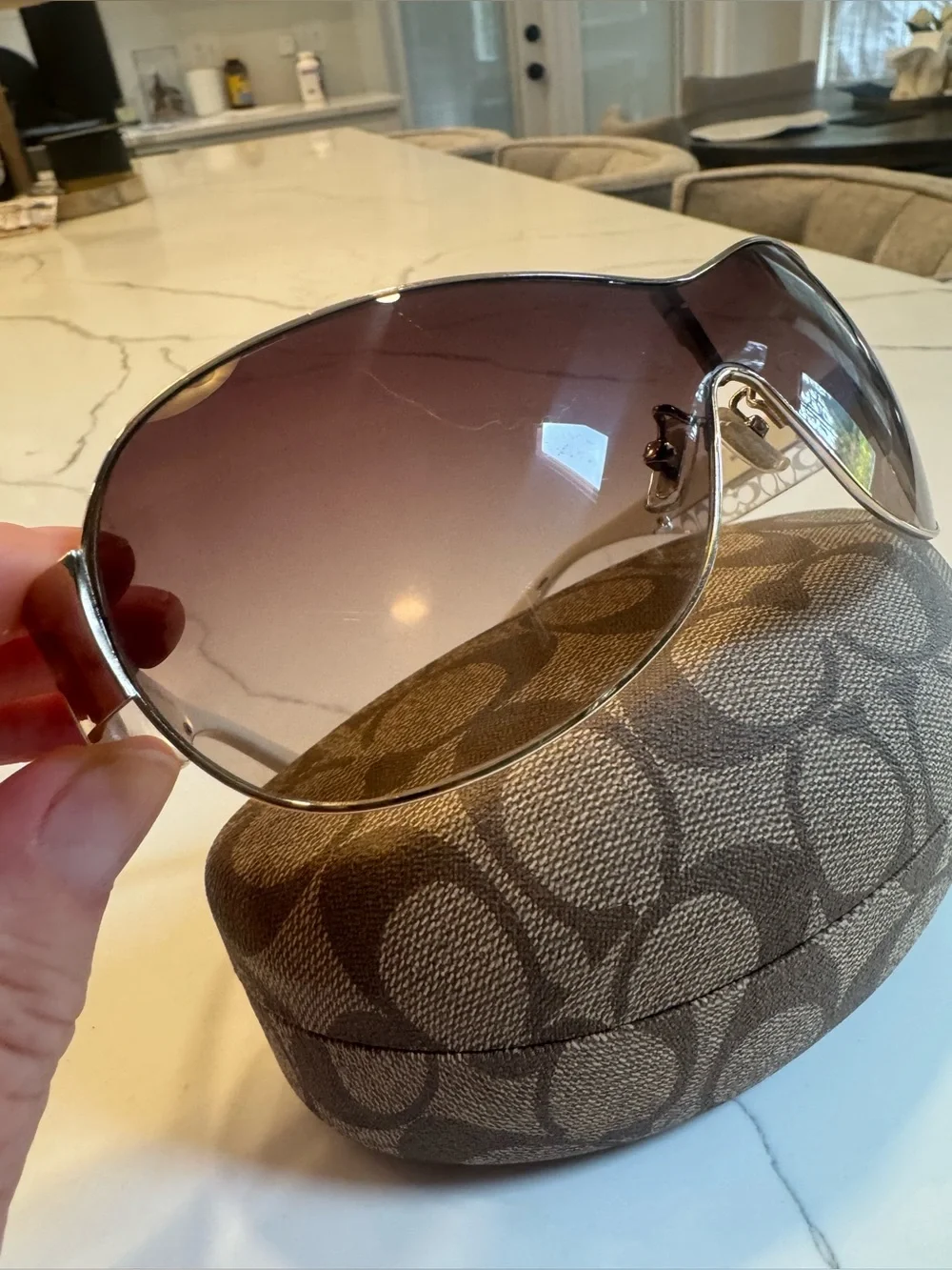 Women’s Coach Leanne S566 wrap golden sunglasses. White with signature C